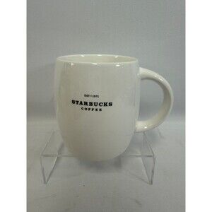 Starbucks barrel coffee mug features the minimalist "ESTD 1971" and "STARBUCKS C